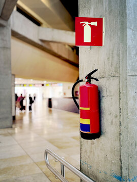 Fire extinguisher in airport terminal for safety awareness