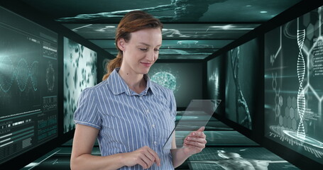 Image of businesswoman using tablet over screens with medical data processing