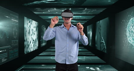 Image of businessman wearing vr headset over screens with medical data processing