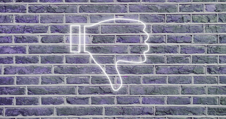 Neon thumbs down sign glowing on brick wall, creating urban street art vibe