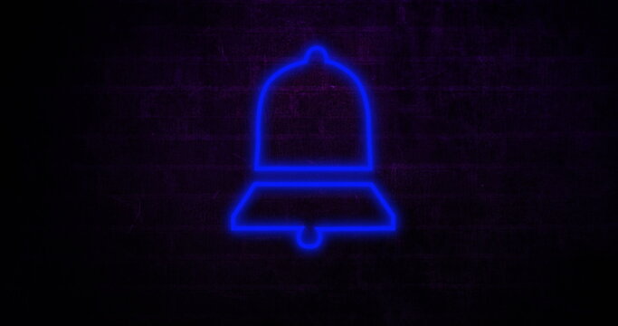 Neon blue bell icon glowing against dark brick wall, creating modern ambiance