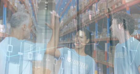 Statistical data processing against male and female volunteers high fiving each other at warehouse