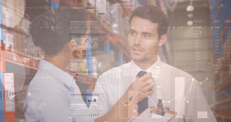 Screens with data processing against male and female supervisor talking to each other at warehouse