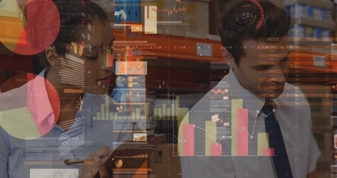 Statistical data processing against diverse male and female supervisor checking stock at warehouse