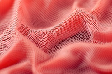 Red mesh textile fabric close up	
