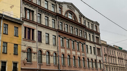 Obraz premium Historic European building facade with classical architecture, urban travel destination, cultural heritage exploration