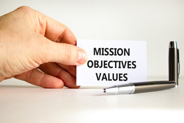 Mission objectives values symbol. Concept words Mission Objectives Values on beautiful white card....