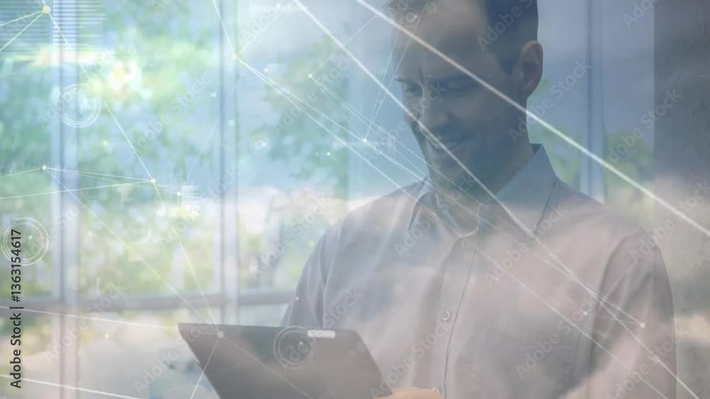 Poster using tablet, man interacting with animation of digital network in nature