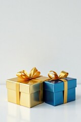 Obraz premium Isolated gift boxes on a table with white background, golden, present, blue