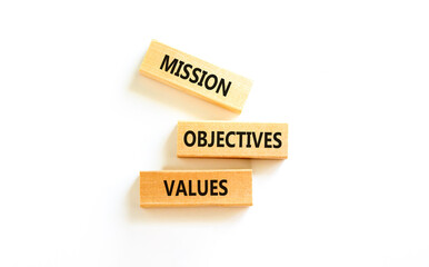 Mission objectives values symbol. Concept words Mission Objectives Values on beautiful blocks....