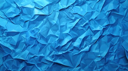 Obraz premium Crumpled vivid blue paper creates textured background