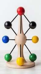 Obraz premium A colorful wooden board game piece with interconnected spheres provides ample copy space for text and strategic game tactics illustration perfect for educational materials and game
