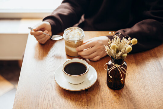 Cozy coffee table setting with dessert and coffee