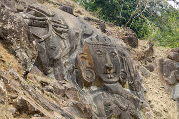 Sculptures carved into the rock at the archaeological site of Unakoti in the state of Tripura. India.