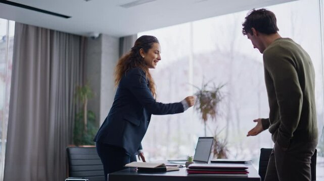 Woman specialist meeting client shaking hands at cabinet room. Business meeting