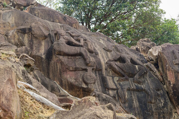 Sculptures carved into the rock at the archaeological site of Unakoti in the state of Tripura. India.