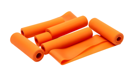 A Collection of Multiple Bright Orange Exercise Resistance Bands on a White Background for Fitness, Workouts, and Rehabilitation Purposes