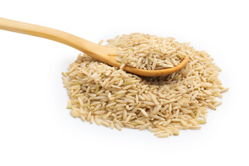 Raw brown rice and spoon isolated on white