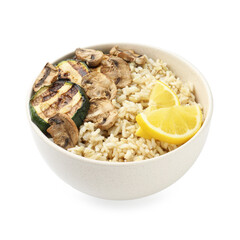 Delicious brown rice with mushrooms, zucchini and lemon slices isolated on white