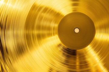 Gold vinyl record on gold background