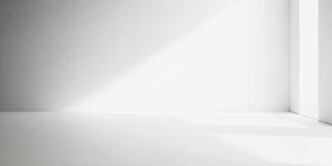 Fototapeta premium A bright, white minimalist room with soft lighting and clean lines, promoting tranquility and simplicity.