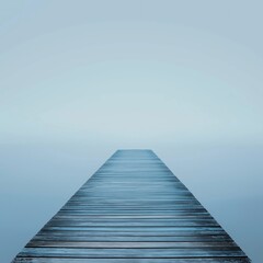 Obraz premium A tranquil wooden dock extends into serene blue waters, embodying peace and natural beauty.