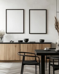 Modern dining room with two empty frames, wooden sideboard, and black chairs.