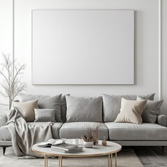 Grey sofa, coffee table, and large blank canvas in minimalist living room.