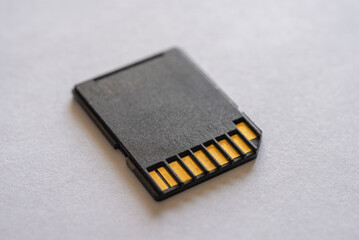 Black sd card on a white table