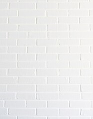 Clean white ceramic brick tile wall texture, subtle grout lines, white brick, background texture