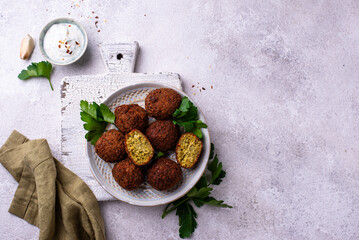 Middle Eastern falafel balls with sauce