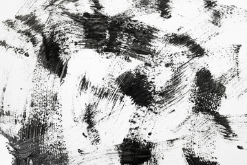 Black strokes and texture mascara or acrylic on a white background. Texture of black mascara for eyelashes isolated on white background. Smear of black mascara for eyelashes on white.