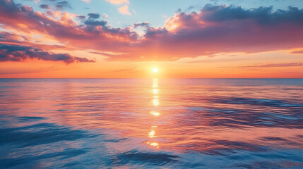 Fototapeta premium Sunrise sky with golden and pink hues spreading across a calm sea, perfect for morning-themed wellness and fitness promotions.