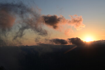 Obraz premium beautiful, cloudy sunrise with wisps of fog