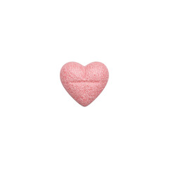 Obraz premium A delicate pink heart shaped pill stands vertically with a matte finish against a crisp white backdrop Bright minimalistic and modern