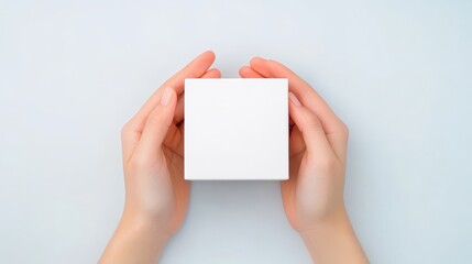 Overhead View of Hands Holding Blank White Box, Mockup, Packaging Design, Product Presentation, Minimalist. Packaging Design, Mockup
