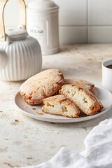 Sochniki (sochni) with cottage cheese. Shortbread cookies with cottage cheese on white kitchen table background. Tea time