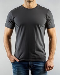Obraz premium Man Wearing Gray T-shirt and Blue Jeans Posing with Hand Pocket
