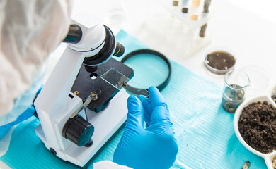 Soil testing in the laboratory. Selective focus.