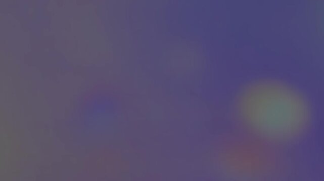 Abstract blurred background loop. Colorful bokeh lights, soft pastel colors. Subtle motion backdrop. Use for graphics overlay, presentations. (149)