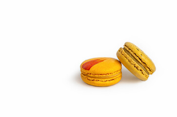 Two macaroons on a white background.