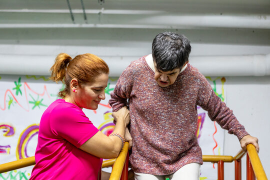 Caregiver supporting a resident in a mental health residence