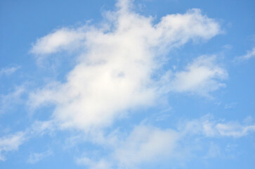 Bright blue sky with white clouds background. Beautiful blue sky with white cloud in sunny day.
