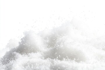 Pile of white granulated sugar, close-up view, isolated on white background.