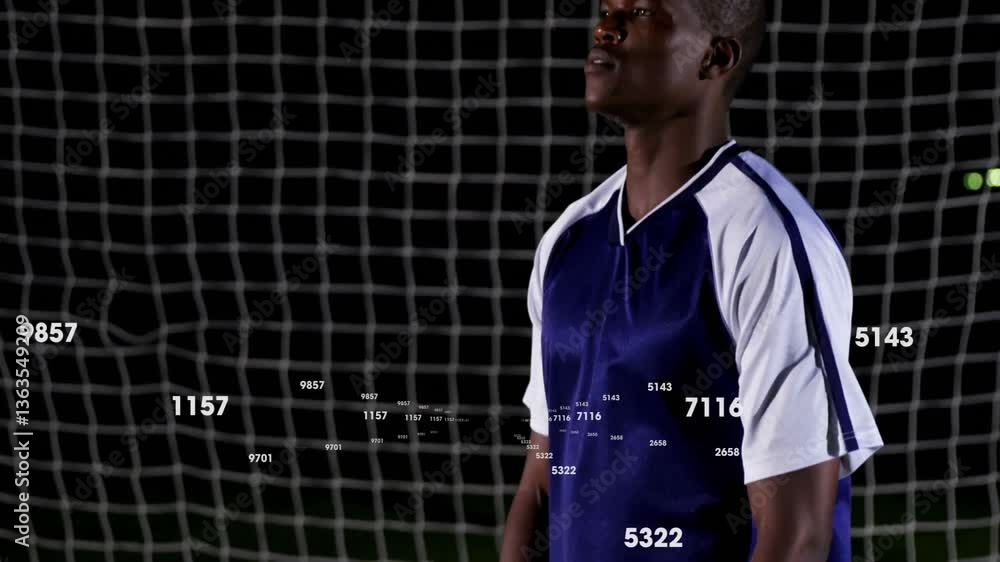Poster standing in front of goal, soccer player with animation of numbers overlay