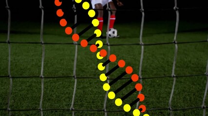 DNA strand animation over soccer player preparing to kick ball on field - Powered by Adobe