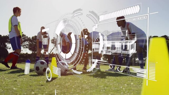 Soccer players practicing on field with digital data processing animation overlay - Powered by Adobe