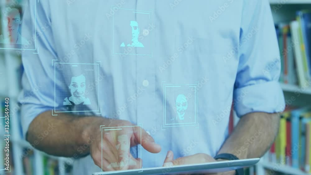 Poster using tablet, man interacting with digital facial recognition animation interface