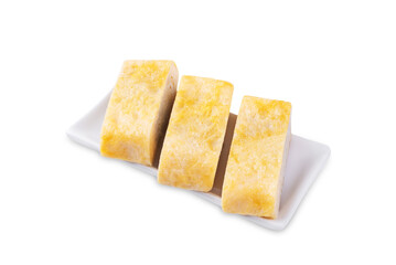 Tamagoyaki, asian omelette roll in a plate on a white isolated background
