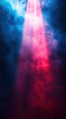 Fototapeta premium Colorful fog with illuminated beams creates a dramatic atmosphere in a dimly lit space